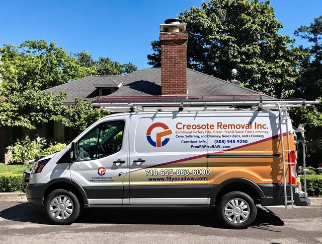 East Windsor Chimney Sweep technician removing creosote safely in East Windsor, CT